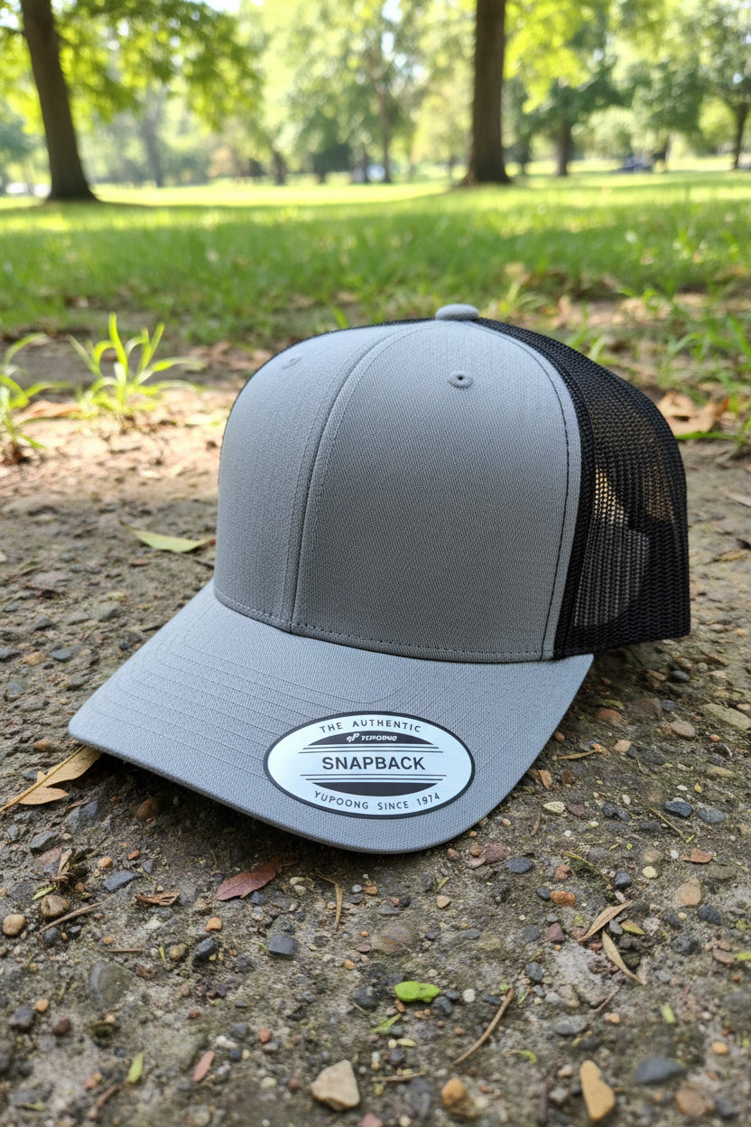 Cap with engraved leather patch